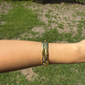 Gold Wavy Pink-Gem Bangle