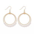 Gold Pearl Double Hoop Earrings — studio picture